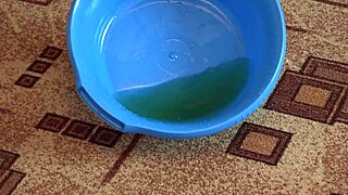 Curvy milf soaks hairy pussy pissing while fingering hard